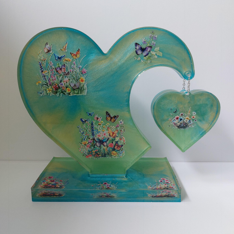 Decoratief hart met hangend hartje.