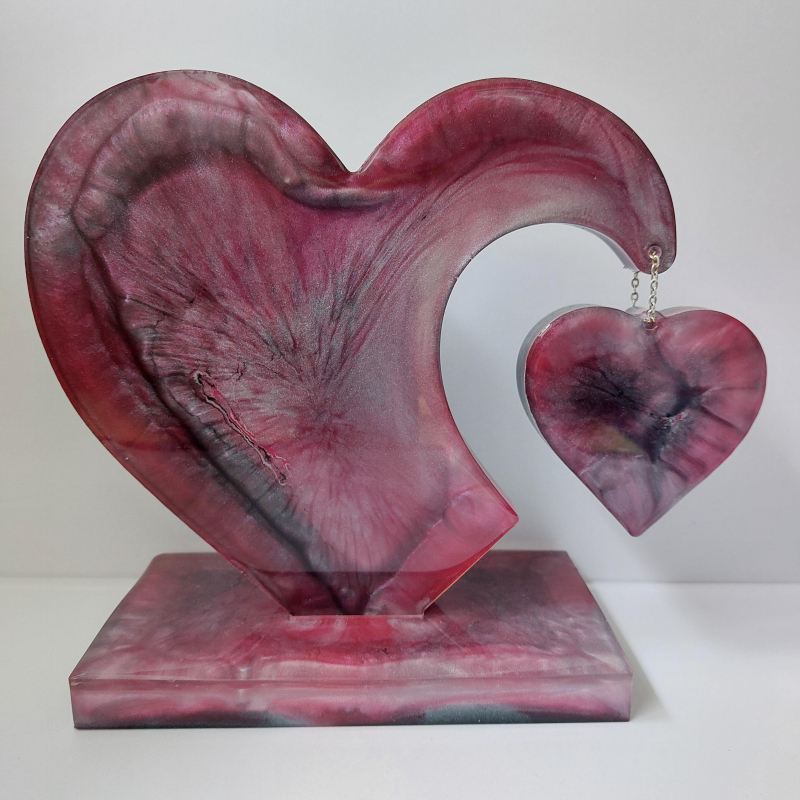 Decoratief hart met hangend hartje.
